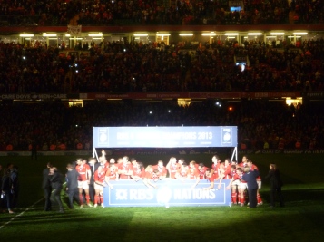 Wales celebrate retaining their Six Nations title after beating England 30-3 at the Millennium Stadium on March 16, 2013